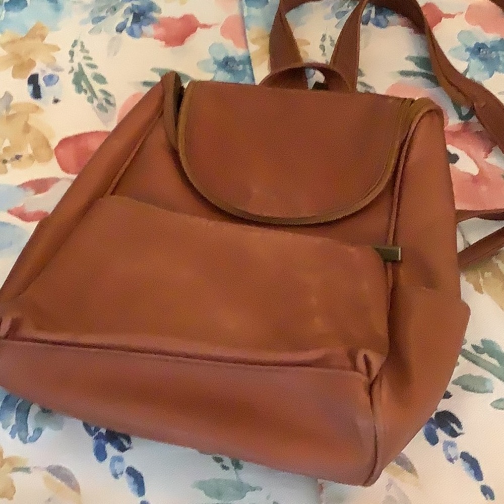 Wilson leather purse backpack for woman or man